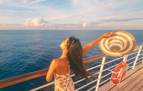 Happy,Cruise,Woman,Relaxing,On,Deck,Feeling,Free,Watching,Sunset